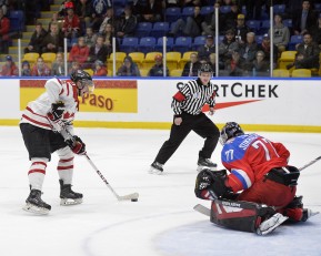 WHITBY, - Dec 14, 2015 -  Game #4 - Russia vs. Canada East at the 2015 World Junior A Challenge at the Iroquois Park Recreation Complex, ON. Édouard Michaud #9 of Team Canada East prepares to shoot the puck on goaltender Vladislav Sukhachev #77 of Team Russia during the second period. (Photo: Shawn Muir / OJHL Images)