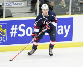 COBOURG, - Dec 15, 2015 -  Game #5 - Canada West vs the United States at the 2015 World Junior A Challenge at the Cobourg Community Centre, ON. Tanner Laczynski #10 of Team United States passes the puck during the first period.(Photo: Tim Bates / OJHL Images)