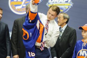 June 24, 2016: Keiffer Bellows dons his Islanders sweater after he was selected as the 19th pick in the first round of the 2016 NHL Entry Draft at First Niagara Center in Buffalo, NY (Photo by John Crouch/Icon Sportswire.)