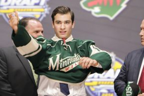 June 24, 2016: Luke Kunin dons his Wild sweater after he was selected by Minnesota as the 15th pick in the first round of the 2016 NHL Entry Draft at First Niagara Center in Buffalo, NY (Photo by John Crouch/Icon Sportswire.)