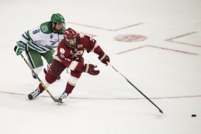 April 07, 2016: Dylan Gambrell (7) of Denver skates away from the pressure of Drake Caggiula (9) of North Dakota during an NCAA Frozen Four game between Denver and North Dakota at Amalie Arena in Tampa, FL. (Photograph by Roy K. Miller/Icon Sportswire)