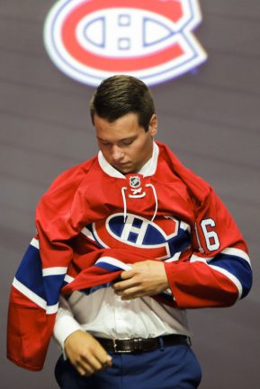 June 24, 2016: Mikhail Sergachyov dons his Canadians sweater after he was selected as the 9th pick in the first round of the 2016 NHL Entry Draft at First Niagara Center in Buffalo, NY (Photo by John Crouch/Icon Sportswire.)