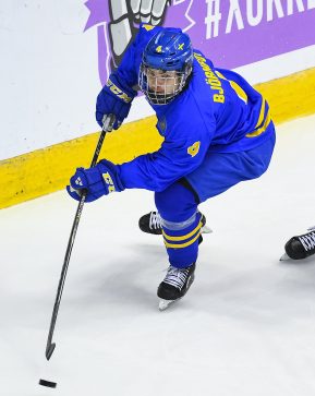 CHELYABINSK, RUSSIA - APRIL 29: Sweden's Tobias Bjornfot #4 carries the puck while followed by Czech Republic's Michal Kvasnica #19 during bronze medal game action at the 2018 IIHF Ice Hockey U18 World Championship. (Photo by Andrea Cardin/HHOF-IIHF Images)