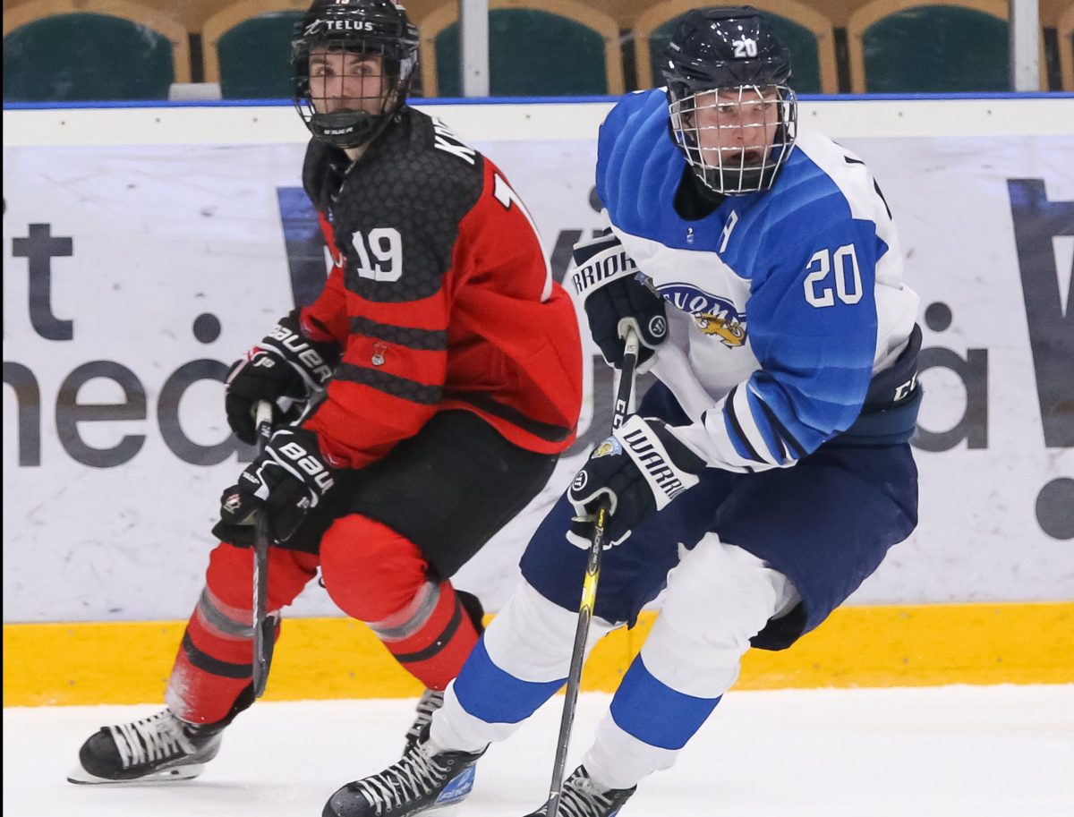 UMEA, SWEDEN - APRIL 18: Finland's Anton Lundell #20 stickhandles the puck against Canada's Peyton Krebs #19 during preliminary round action of the 2019 IIHF Ice Hockey U18 World Championship at A3 Arena on Apirl 18, 2019 in Umea, Sweden. (Photo by Chris Tanouye/HHOF-IIHF Images)