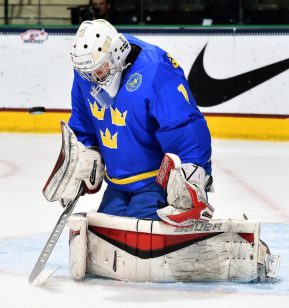 GRAND FORKS, NORTH DAKOTA - APRIL 24: Sweden's Filip Gustavsson #1 makes the save during gold medal game action against Finland at the 2016 IIHF Ice Hockey U18 World Championship. (Photo by Minas Panagiotakis/HHOF-IIHF Images)