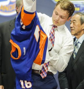 June 24, 2016: Keiffer Bellows dons his Islanders sweater after he was selected as the 19th pick in the first round of the 2016 NHL Entry Draft at First Niagara Center in Buffalo, NY (Photo by John Crouch/Icon Sportswire.)