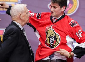 June 24, 2016: Logan Brown is congratulated by Ottawa Senators management and coaches after he was selected as the 11th pick in the first round of the 2016 NHL Entry Draft at First Niagara Center in Buffalo, NY (Photo by John Crouch/Icon Sportswire.)