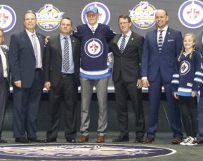 June 24, 2016: Patrik Laine poses for a group picture with Jets coaches and staff after being chosen second by the Winnipeg Jets during the 2016 NHL Entry Draft at First Niagara Center in Buffalo, NY (Photo by John Crouch/Icon Sportswire.)