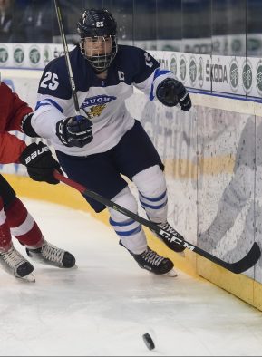 POPRAD, SLOVAKIA - APRIL 15: Finland's Aarne Talvitie #25 races Switzerland's Davyd Barandun #2 for the puck during preliminary round action at the 2017 IIHF Ice Hockey U18 World Championship. (Photo by Andrea Cardin/HHOF-IIHF Images)