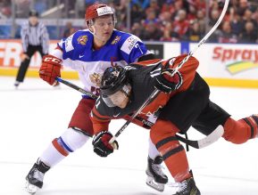 TORONTO, ON - DECEMBER 26:  Canada forward Mathieu Joseph (11) collides with Russia forward Kirill Kaprizov (7) during the World junior Hockey Championships on December 26, 2016, at the Air Canada Centre in Toronto, Ontario. (Photo by Dan Hamilton/Icon Sportswire)
