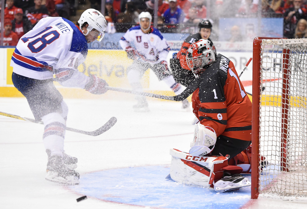 TORONTO, ON - DECEMBER 31, 2016 : Canada goalie Connor Ingram (1) makes a save on USA forward Colin White (18) in the first period at the World Junior Hockey Championships on December 31, 2016, at the Air Canada Centre. (Photo by Dan Hamilton/Icon Sportswire)