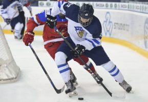 Finland's Santeri Virtanen #22 carries the puck during semifinal round action at the 2017 IIHF Ice Hockey U18 World Championship. (Photo by Andrea Cardin/HHOF-IIHF Images)