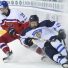 POPRAD, SLOVAKIA - APRIL 20: Czech Republic's Filip Chytil #20 bodychecks Finland's Aleksi Anttalainen #4 during quarterfinal round action at the 2017 IIHF Ice Hockey U18 World Championship. (Photo by Andrea Cardin/HHOF-IIHF Images)