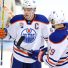 ANAHEIM, CA - JANUARY 25: Edmonton Oilers captain Connor McDavid (97) reacts during the third period after Oilers center Leon Draisaitl (29) scores the fourth goal of the game for Edmonton in a game against the Anaheim Ducks played on January 25, 2017 at the Honda Center in Anaheim, CA. (Photo by John Cordes/Icon Sportswire)