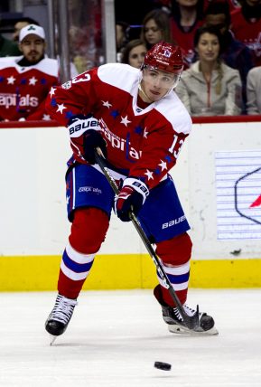 WASHINGTON, DC - MARCH 16: Washington Capitals left wing Jakub Vrana (13) makes a pass during an NHL game on March 16, 2017, at the Verizon Center, in Washington, D.C. between the Washington Capitals and the Nashville Predators. Nashville won 2-1 in overtime.   (Photo by Tony Quinn/Icon Sportswire)