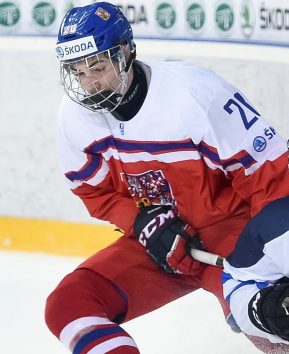 POPRAD, SLOVAKIA - APRIL 20: Czech Republic's Filip Chytil #20 bodychecks Finland's Aleksi Anttalainen #4 during quarterfinal round action at the 2017 IIHF Ice Hockey U18 World Championship. (Photo by Andrea Cardin/HHOF-IIHF Images)