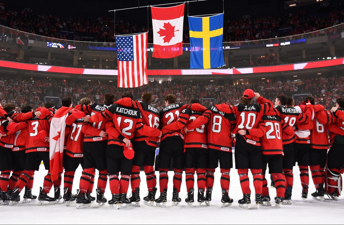 BUFFALO, NEW YORK - JANUARY 5: Canada against Sweden during the gold medal game of the 2018 IIHF World Junior Championship. (Photo by Andrea Cardin/HHOF-IIHF Images)