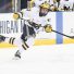 ANN ARBOR, MI - MARCH 03: Michigan Wolverines defenseman Quinn Hughes (43) passes the puck during the Michigan Wolverines game versus the Wisconsin Badgers in the BIG10 Hockey Tournament on March 3, 2018, at Red Berenson Rink at Yost Ice Arena in Ann Arbor, Michigan. (Photo by Steven King/Icon Sportswire)