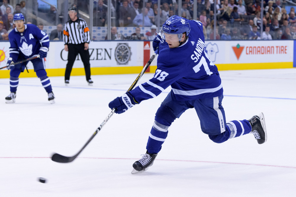 TORONTO, ON - SEPTEMBER 24: Toronto Maple Leafs Defenceman Rasmus Sandin (78) shoots the puck during the NHL preseason game between the Montreal Canadiens and the Toronto Maple Leafs on September 24, 2018, at Scotiabank Arena in Toronto, ON, Canada. (Photo by Julian Avram/Icon Sportswire)