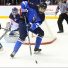 CHELYABINSK, RUSSIA - APRIL 19: Finland's Kaapo Kakko #33 plays the puck while while Slovakia's Nicolas Ferenyi #11 looks on during preliminary round action at the 2018 IIHF Ice Hockey U18 World Championship. (Photo by Andrea Cardin/HHOF-IIHF Images)