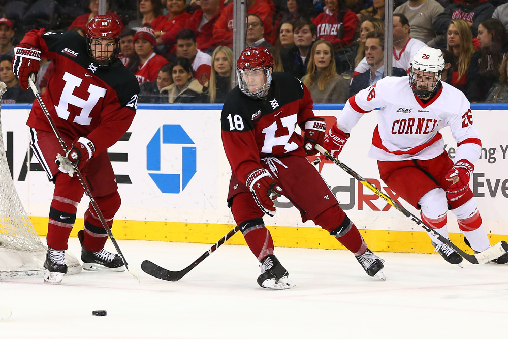NEW YORK, NY - NOVEMBER 24: Harvard Crimson defenseman Adam Fox (18) skates during the 2018 Frozen Apple College Hockey game between the Cornell Big Red and the Harvard Crimson on November 24, 2018 at Madison Square Garden in New York, NY. (Photo by Rich Graessle/Icon Sportswire)