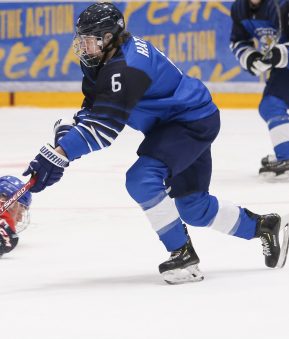 UMEA, SWEDEN - APRIL 21: Finland's Santeri Hatakka #6 stickhandles the puck against Czech Republic's Radek Kucerik #20 falls to the ice during the preliminary round of the 2019 IIHF Ice Hockey U18 World Championship at A3 Arena on April 21, 2019 in Umea, Sweden. (Photo by Chris Tanouye/HHOF-IIHF Images)