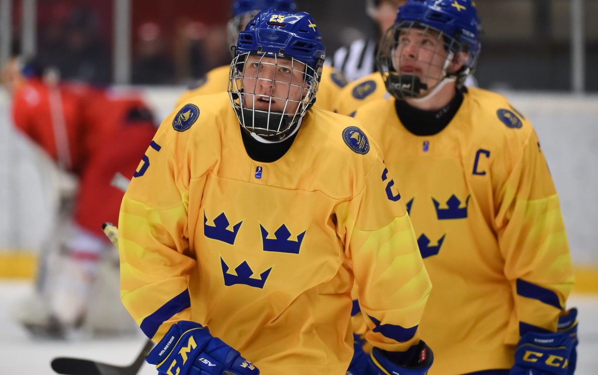 ORNSKOLDSVIK, SWEDEN - APRIL 23: Swedens Simon Holmstrom #25 skates to the bench after scoring a third period goal against Russia during preliminary round action at the 2019 IIHF Ice Hockey U18 World Championship at Fjallraven Center on April 23, 2019 in Ornskoldsvik, Sweden. (Photo by Steve Kingsman/HHOF-IIHF Images)