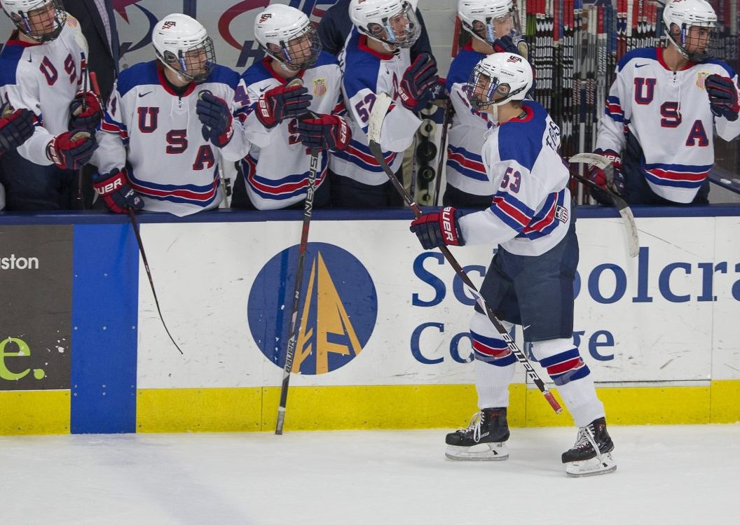 Trevor Zegras and the  NTDP celebrate a goal. Photo courtesy of USNTDP.