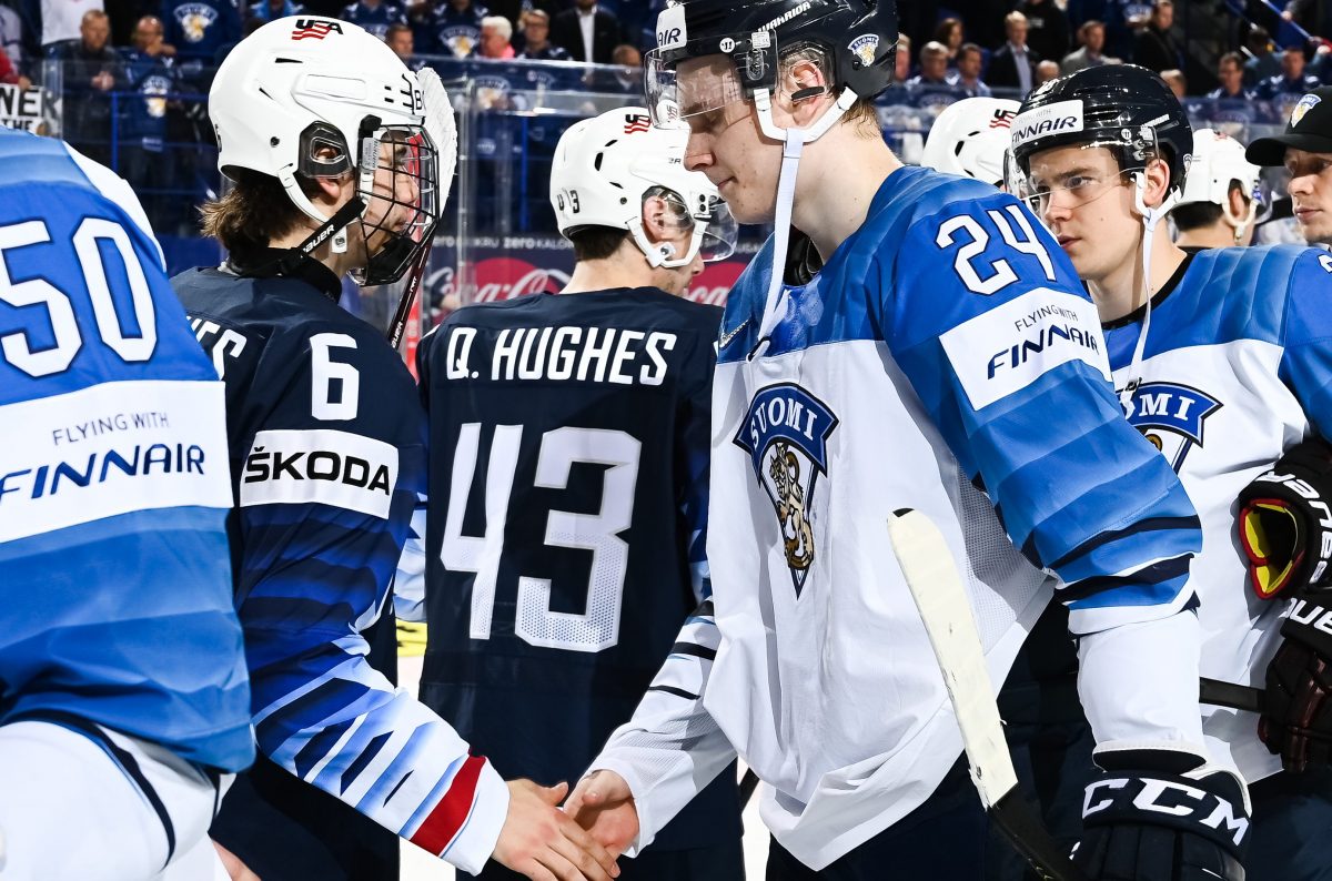 KOSICE, SLOVAKIA - MAY 13: USA's Jack Hughes #6 and Finland's Kaapo Kakko #24 shake hands following a 3-2 overtime win for team USA during preliminary round action of the 2019 IIHF Ice Hockey World Championship at Steel Arena on May 13, 2019 in Kosice, Slovakia. (Photo by Matt Zambonin/HHOF-IIHF Images)