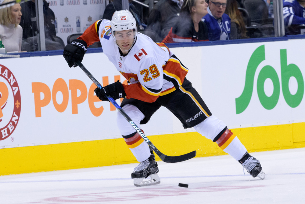 TORONTO, ON - OCTOBER 29: Calgary Flames Left Wing Dillon Dube (29) skates with the puck during the NHL regular season game between the Calgary Flames and the Toronto Maple Leafs on October 29, 2018, at Scotiabank Arena in Toronto, ON, Canada. (Photo by Julian Avram/Icon Sportswire)