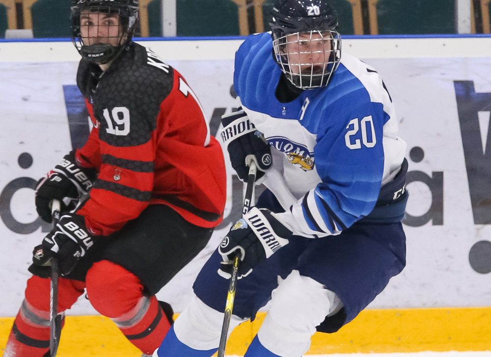 UMEA, SWEDEN - APRIL 18: Finland's Anton Lundell #20 stickhandles the puck against Canada's Peyton Krebs #19 during preliminary round action of the 2019 IIHF Ice Hockey U18 World Championship at A3 Arena on Apirl 18, 2019 in Umea, Sweden. (Photo by Chris Tanouye/HHOF-IIHF Images)
