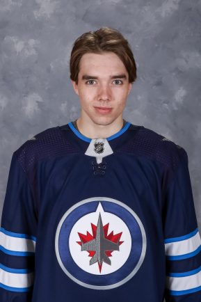 WINNIPEG, MB - SEPTEMBER 12: Ville Heinola #36 of the Winnipeg Jets poses for his official headshot for the 2019-2020 season on September 12, 2019 at the Bell MTS Iceplex in Winnipeg, Manitoba, Canada. (Photo by Jonathan Kozub/NHLI via Getty Images) *** Local Caption *** Ville Heinola