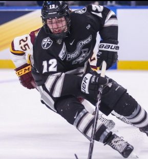 BUFFALO, NY - APRIL 11: Providence Friars Forward Jack Dugan (12) skates up ice during the NCAA Frozen Four men's hockey game between Providence Friars and Minnesota Duluth Bulldogs on April 11, 2019 at KeyBank Center in Buffalo, NY. (Photo by Jerome Davis/Icon Sportswire)