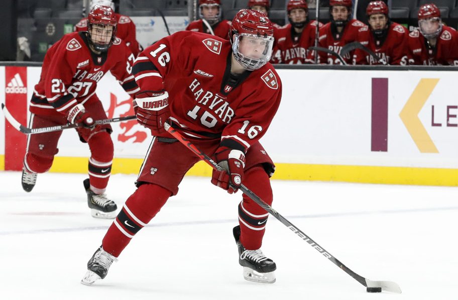 BOSTON, MA - FEBRUARY 10: Harvard University Crimson forward Nick Abruzzese (16) carries the puck during the Beanpot consolation game between the Harvard Crimson and the Boston College Eagles on February 10, 2020, at TD Garden in Boston, Massachusetts. (Photo by Fred Kfoury III/Icon Sportswire)