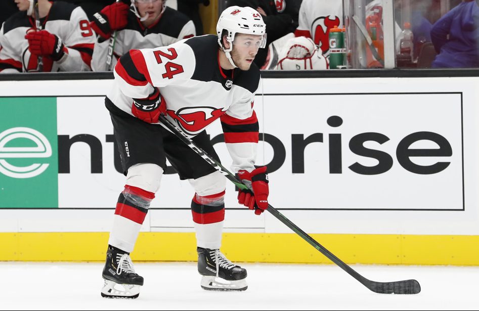 BOSTON, MA - SEPTEMBER 25: New Jersey Devils defenseman Ty Smith (24) waits for the face off during a preseason game between the Boston Bruins and the New Jersey Devils on September 25, 2019, at TD Garden in Boston, Massachusetts. (Photo by Fred Kfoury III/Icon Sportswire)