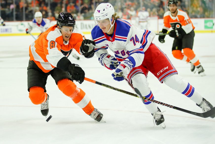 PHILADELPHIA, PA - SEPTEMBER 21: New York Rangers right wing Vitali Kravtsov (74) tries to take the puck to the net past Philadelphia Flyers defenseman Robert Hagg (8) during the NHL Preseason game between the New York Rangers and Philadelphia Flyers on September 21, 2019, at Wells Fargo Center in Philadelphia, PA. (Photo by Nicole Fridling/Icon Sportswire)