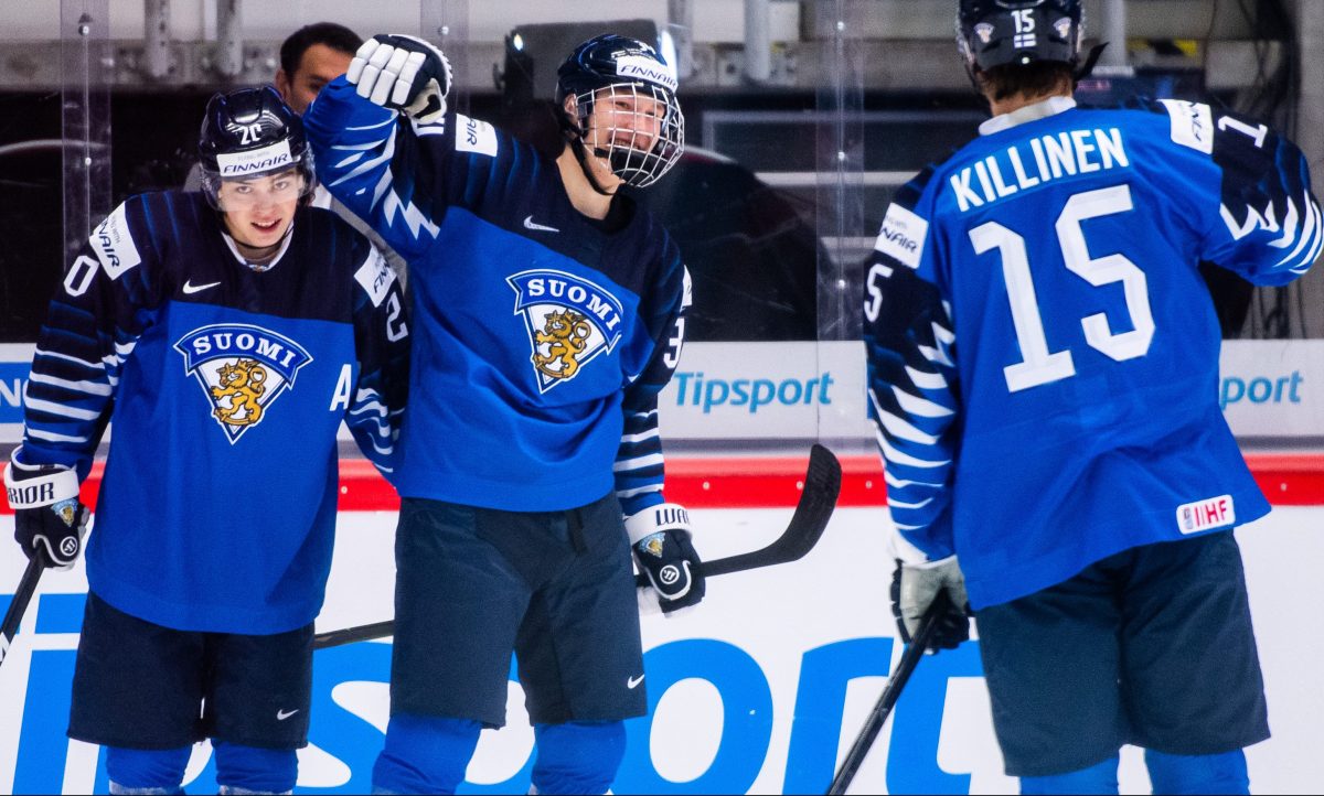Matias Macceli, Aatu Räty and Lenni Killinen of Finland celebrate the 4-0 goal during the 2020 IIHF World Junior Championship game between Finland and Slovakia on December 28, 2019 in Trinec. Photo: Simon Hastegård / BILDBYRÅN / 
