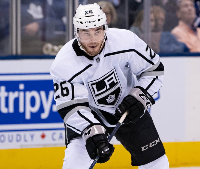 TORONTO, ON - NOVEMBER 05: Los Angeles Kings Defenceman Sean Walker (26) skates with the puck during the NHL regular season game between the Los Angeles Kings and the Toronto Maple Leafs on November 5, 2019, at Scotiabank Arena in Toronto, ON, Canada. (Photo by Julian Avram/Icon Sportswire)