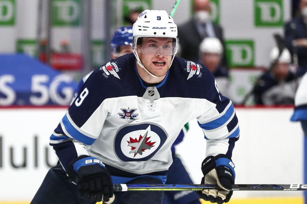 VANCOUVER, BC - MARCH 24: Winnipeg Jets Left Wing Andrew Copp (9) on ice against the Vancouver Canucs. Copp scored 4 goals to help the Jets defeat the Canucks 5-1 during their NHL game at Rogers Arena on March 24, 2021 in Vancouver, British Columbia, Canada. (Photo by Devin Manky/Icon Sportswire)