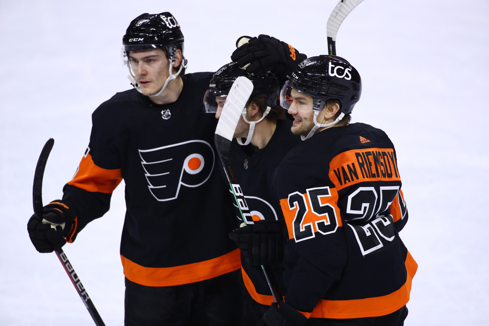 PHILADELPHIA, PA - JANUARY 31: Philadelphia Flyers Right Wing James van Riemsdyk (25) celebrates a goal with Right Wing Joel Farabee (86) and Defenceman Philippe Myers (5) in the first period during the game between the New York Islanders and Philadelphia Flyers on January 31, 2021 at Wells Fargo Center in Philadelphia, PA. (Photo by Kyle Ross/Icon Sportswire)