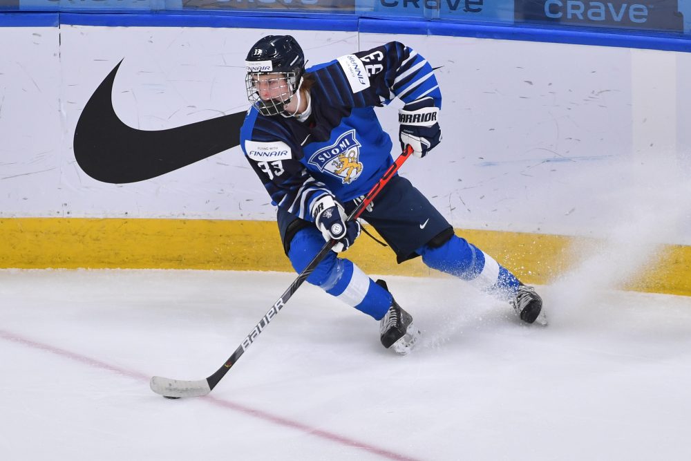 Finnish Junior Hockey Team's On-Ice Celebration Features Wig