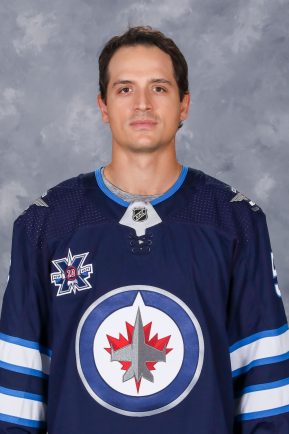 WINNIPEG, CANADA ñ JANUARY 03: Luca Sbisa #5 of the Winnipeg Jets poses for his official headshot for the 2020-2021 season on January 3, 2021 at the Bell MTS Iceplex in Winnipeg, Manitoba, Canada. (Photo by John Delaney/NHLI via Getty Images)