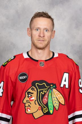 CHICAGO, ILLINOIS - SEPTEMBER 21:  Corey Perry #94 of the Chicago Blackhawks poses for his official headshot for the 2023-2024 season at the United Center on September 21, 2023 in Chicago, Illinois. (Photo by Chase Agnello-Dean/NHLI via Getty Images)